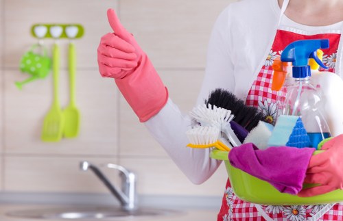 Carpet cleaning service preparing a room for deep cleaning